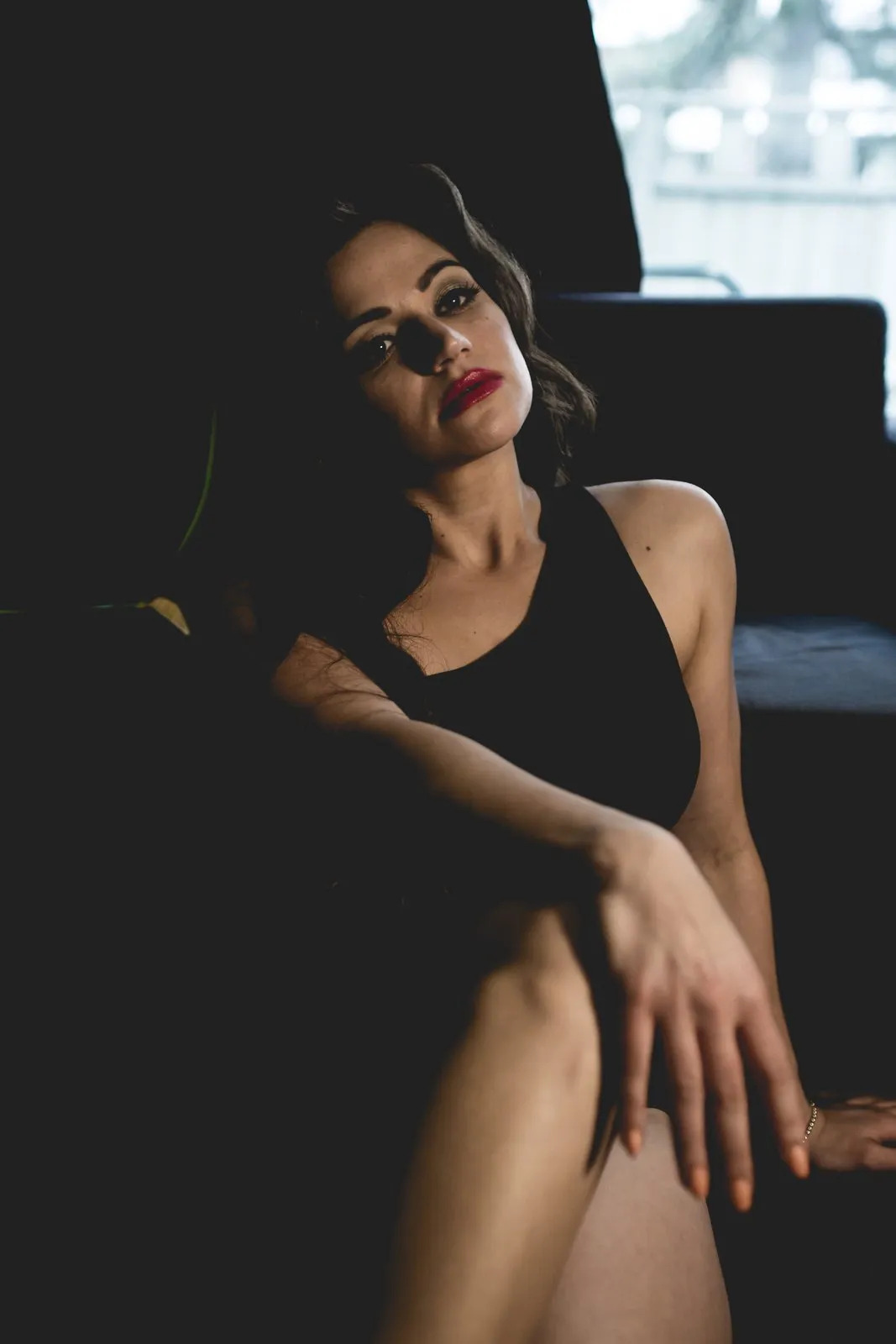 Low-light portrait, most of the frame in shadow