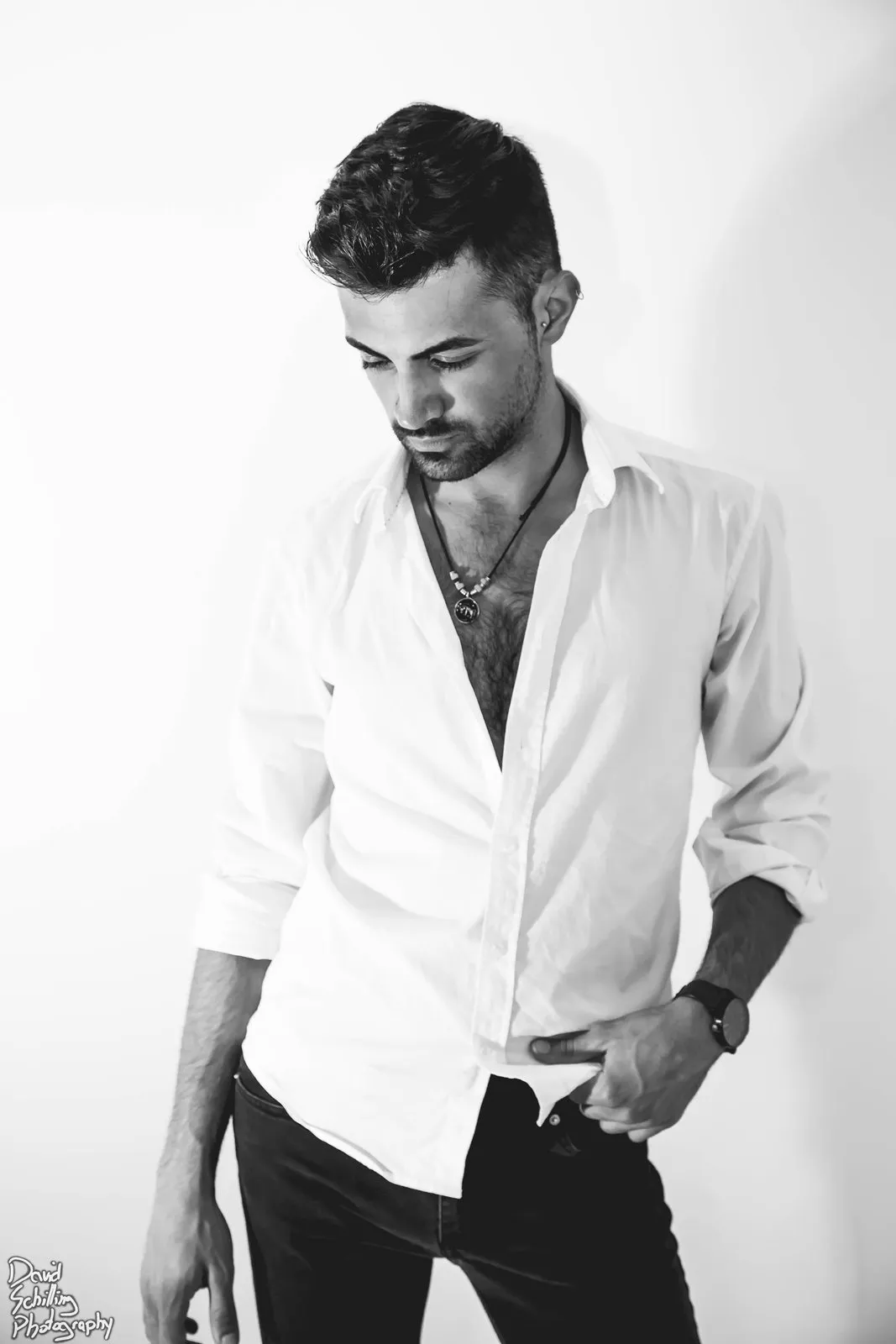 Black and white portrait, open white shirt